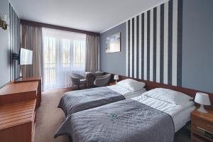Zespół Tatry - Hotel Tatry i Budynek Turystyczny客房内的一张或多张床位