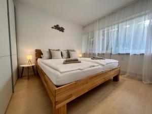 Postel nebo postele na pokoji v ubytování Seeblick in Sipplingen