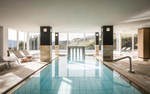 The swimming pool at or close to Falkensteiner Hotel & Spa Sonnenparadies