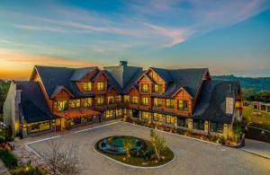 an aerial view of a large house at Hotel Château Du Golden in Gramado