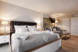 Postel nebo postele na pokoji v ubytování Hotel Zweite Heimat