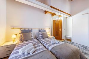 Postel nebo postele na pokoji v ubytování Casa Felice Venas