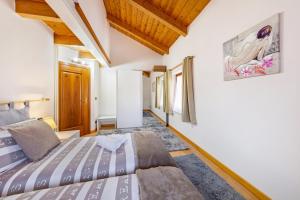 Postel nebo postele na pokoji v ubytování Casa Felice Venas