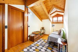 Postel nebo postele na pokoji v ubytování Casa Felice Venas