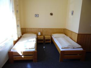 Posteľ alebo postele v izbe v ubytovaní Penzion Velke Darko