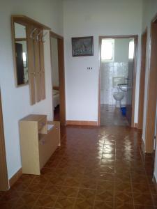 an empty room with a room with a bathroom at Holiday Home Pavica in Vrsi