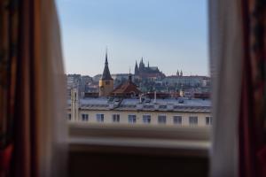 a view of a city from a window at Hotel Liberty in Prague
