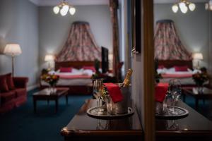 Postel nebo postele na pokoji v ubytování Hotel Liberty