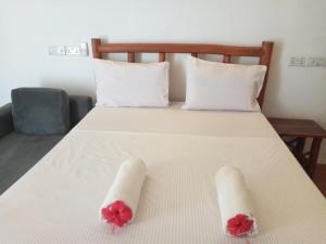 Postel nebo postele na pokoji v ubytování Jambo Kendwa Villa