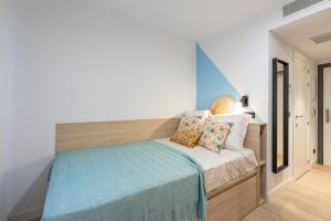 Postel nebo postele na pokoji v ubytování Micampus Salamanca Student Residence