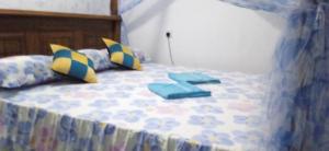 Ένα ή περισσότερα κρεβάτια σε δωμάτιο στο top sea view guest