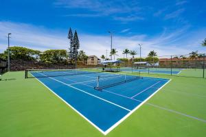 two tennis courts on a tennis court at CheCaHale: Gorgeous Top Floor Corner With AC in Kailua-Kona