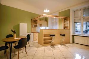 Η κουζίνα ή μικρή κουζίνα στο R171 Elitehost Ráday Apartment