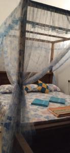 Ένα ή περισσότερα κρεβάτια σε δωμάτιο στο top sea view guest