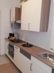 Dapur atau dapur kecil di Anna Luxury Apartment +4 gambar