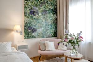 Postel nebo postele na pokoji v ubytování Small Luxury Hotel Altstadt Vienna