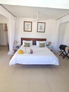 Katil atau katil-katil dalam bilik di Dhow Inn Boutique Hotel +83 gambar