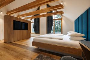 Postel nebo postele na pokoji v ubytování Ambient Resort Bled