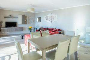 a dining room with a table and chairs at LE MIDI 8 by ESTATES CANNES in Cannes