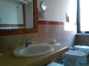 Vannituba majutusasutuses Hotel Sette Note