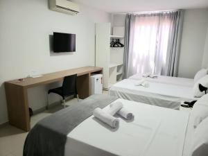 Postel nebo postele na pokoji v ubytování Hotel Rochedo, Penedo - Alagoas