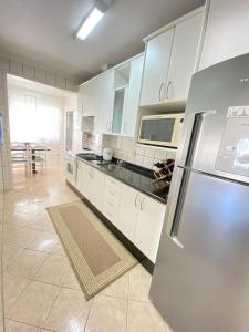 Η κουζίνα ή μικρή κουζίνα στο Apartamento próximo praia Balneário Camboriú
