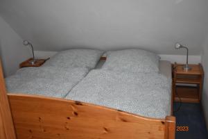 Haus Schimmelreiter 객실 침대