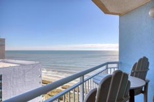 a balcony with chairs and a view of the ocean at 2501 S Ocean Blvd, 1127 - Ocean View Sleeps 6 in Myrtle Beach