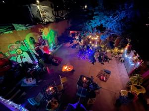 an overhead view of a party at night with lights at Historika Hostel Cultural in San Cristóbal de Las Casas