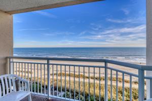 a balcony with a view of the beach at 2501 S Ocean Blvd, 0505 - Ocean Front Sleeps 6 in Myrtle Beach