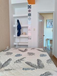 - une chambre avec un lit dans l'établissement Departamento PET Friendly, à Chancay