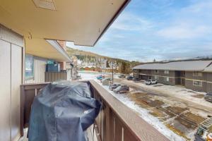 a balcony with a view of a street and a building at Mountian View Condo Unit S303 in Dillon