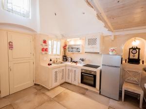 Kuchyň nebo kuchyňský kout v ubytování Luxury Villas Hariton