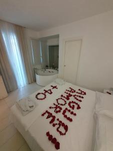 Postel nebo postele na pokoji v ubytování Hotel Al Cavallino Bianco
