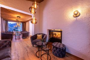 Posezení v ubytování Hotel AlpinaRos