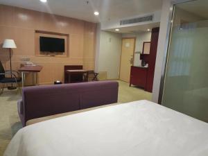 Sjónvarps- og/eða afþreyingartæki á Guangdong Baiyun City Hotel