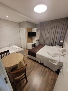 Postel nebo postele na pokoji v ubytování Hotel Emacite Flex