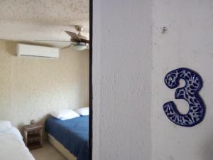 Letto o letti in una camera di Naranjo Hostel