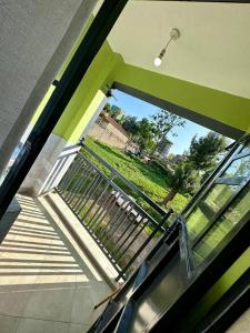 a view from the inside of a building with a window at Candy's Staycation in Thika