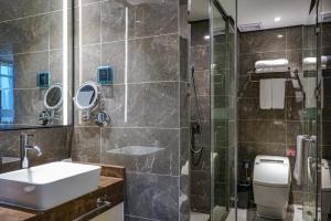 Baðherbergi á Guangdong Baiyun City Hotel
