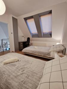 Postel nebo postele na pokoji v ubytování Apartament Gwiazda 503