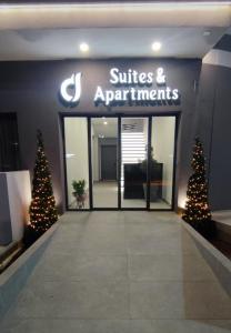 a store with christmas trees in front of it at d Suites and Apartments in Ioannina