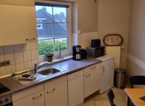 Η κουζίνα ή μικρή κουζίνα στο Residenz Rosengrund WHG O3