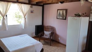 Televiisor ja/või meelelahutuskeskus majutusasutuses Mana