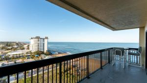 a balcony with a view of the ocean at Oceanfront spectacular views with direct beach and pool access! in Ormond Beach