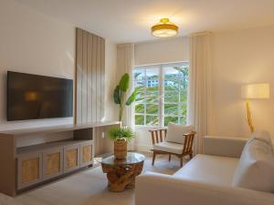 TV a/nebo společenská místnost v ubytování Bentley Hotel South Beach