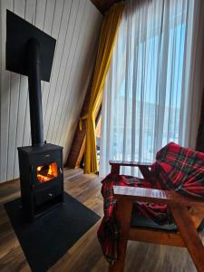 Khu vực ghế ngồi tại B&B Cottage in Mestia