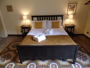 Postel nebo postele na pokoji v ubytování B&B Genova Centro