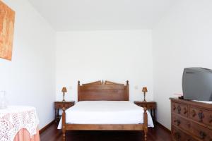 Ένα ή περισσότερα κρεβάτια σε δωμάτιο στο Quinta Da Longra