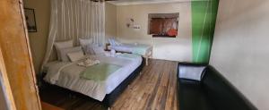 A bed or beds in a room at Loki Cusco